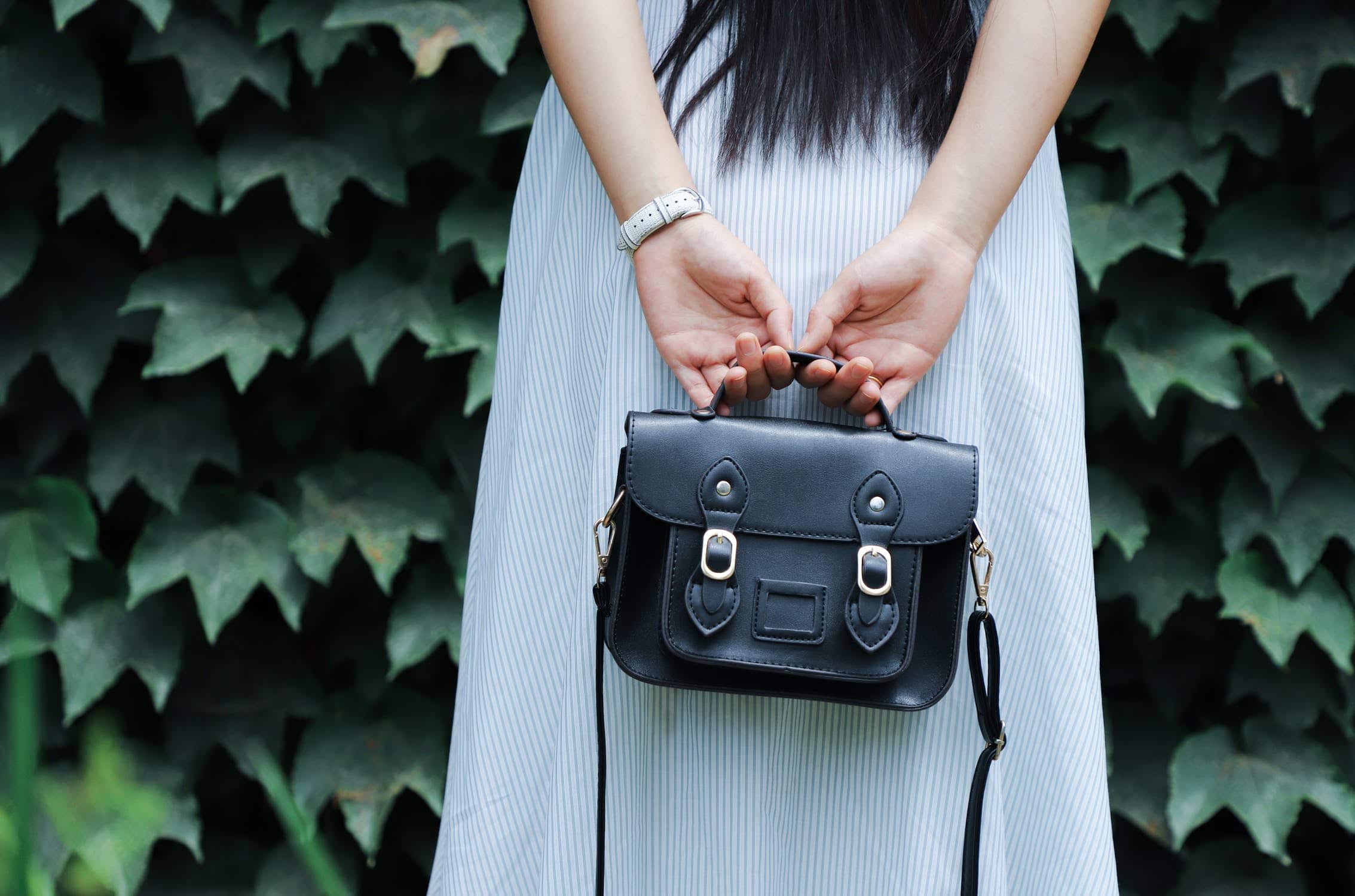 Woman Holding a New Handbag